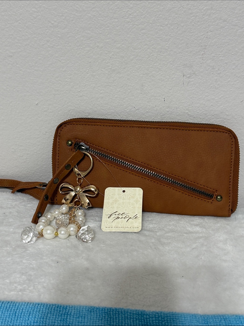 Free People Cognac Zip Wristlet with Pearl Charm